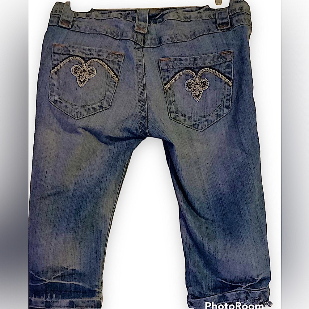 Junior pair of bike length jeans. In pre owned condition.